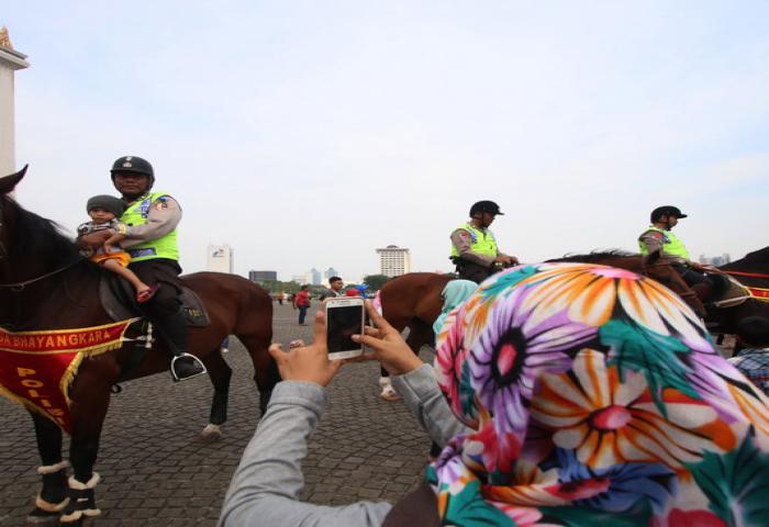 Monas Padat Pengunjung Meski Tak Ada Pesta Pergantian Tahun